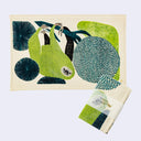Decorative towel with sloth design on a white background
