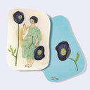 Two rounded corner postcards with artistic illustrations of a woman and flowers on a light blue background.