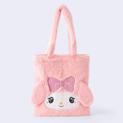 Fluffy pink faux fur tote bag with My Melody's face on the front with 3D fluffy ears and an embroidered pink box over her forehead. Her eyes have a cute, kawaii sparkle.