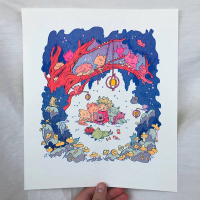 Colorful risograph print of a small girl sitting in an open forest clearing reading a book with creatures around her. In the trees are more creatures, hanging down from the branches and listening in.