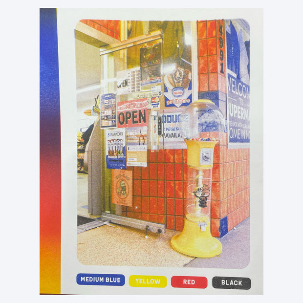 Print featuring a photo of the outside of a liquor store, with an almost empty yellow gumball machine.