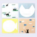 A set of four square memo pad sheets featuring minimalist cat and fish illustrations in different colorways: white, light blue, pale yellow, and beige.
