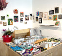Display of art prints and stationery items in a store.