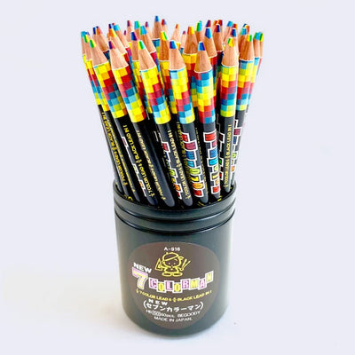Black cup filled with rainbow colored pencils, each pencil containing 7 colors and an HB lead in one tip.