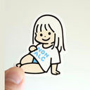 Cartoon sticker of a girl with 'NON ALC' text on a white background