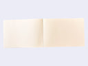 Open blank page spread in a rectangular memo pad.