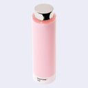 A Pantone 152 light pink cylindrical color swatch bottle with a reflective silver cap, shown on a light gray background.