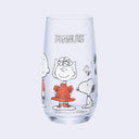 Clear glass with "Peanuts" written along the top and standing characters - Sally, Snoopy, Lucy and Charlie Brown colored only in white and orange.