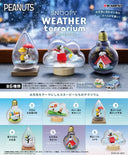 Snoopy weather terrariums with different weather conditions on a display stand.