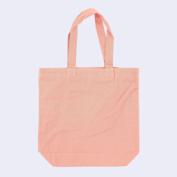 Back view of a pink tote bag, without any design printed on the back.