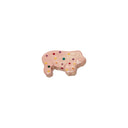 Small ceramic figurine of a pink frosted animal cookie with sprinkles, shaped like a pig.