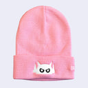 Pink beanie with a white embroidery on the front fold of a Big Boss Robot head.