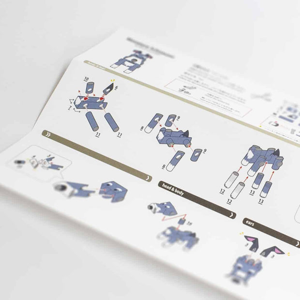Set of instructions for paper sculpture, with visual details of how to construct and assemble each piece.
