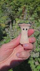 Video of mushroom sculpture being shown in the sunlight.