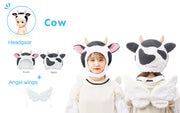 Photo display of the Sonny Angel Cow costume, a white fluffy cow shaped hood hat with black spots, pink inner ears and small horns. Includes a matching set of white wings. A girl models the hat and wings.