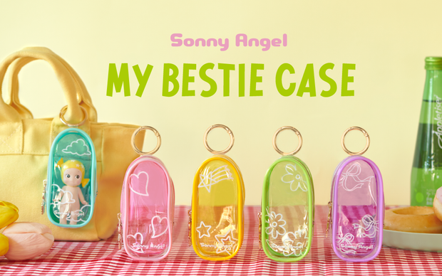 5 clear colored oval shaped pouches attached to keychains, with gold keychain hardware and a small golden Sonny Angel on the side. Colors are: purple, green, yellow, blue and pink.