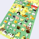 Sheet of colorful dog-themed stickers on a green background