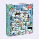 1000 piece puzzle box with colorful illustration of a bookshelf with many trinkets, decorative items and several cats climbing onto it.