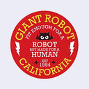 Red circle sticker with yellow and white text and black illustrative elements. Reads "Giant Robot" on top, "fit enough for a robot but made for a human" in the middle and "California" on the bottom. A small robot logo is in the middle and a lightning bolt on the left and right side.