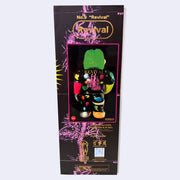 Side view of large black box with pink decorative background text and gold shiny title text that reads "No.9 'Revival'". It shows a large gorilla figure, with a half cyborg face and colorful limbs and clothing.