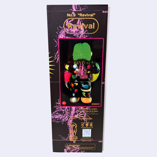Side view of large black box with pink decorative background text and gold shiny title text that reads "No.9 'Revival'". It shows a large gorilla figure, with a half cyborg face and colorful limbs and clothing.