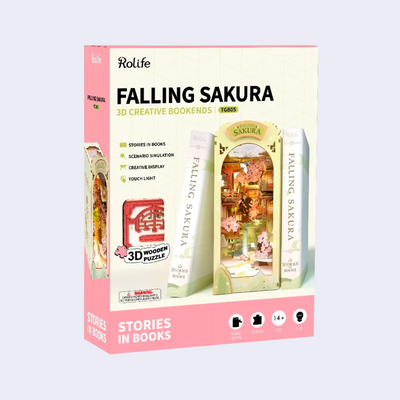 Product packaging for Falling Sakura Bookend, with a photo of the assembled piece on the front of the box along with some information.