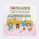 Cream colored hand towel with a printed illustration of Sanrio characters on and around a school bus, with text that reads "HAPIDANBUI - Let's enjoy our student life. Let's study together and make happy memories."