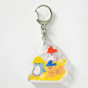 Acrylic keychain of a group of cartoon animals sitting on a bamboo mat in a sauna, wearing hats with steam clouds around them.