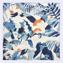 Bandana with blue, white and orange illustration of characters sitting on and around large leaves.