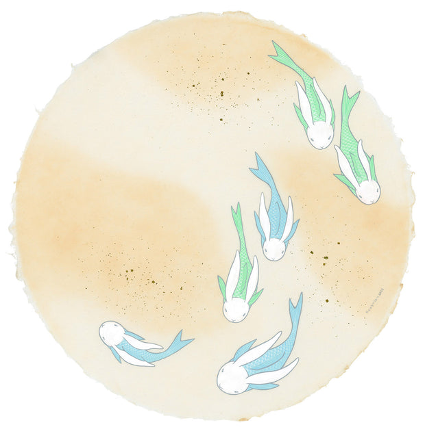 Paper circle with deckled edges and a soft orange and cream colored watercolor background. Blue and green fish with white bunny heads swim calmly.