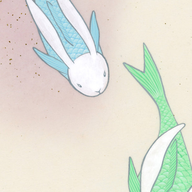 Paper circle with deckled edges and a soft olive green and cream colored watercolor background. Blue and green fish with white bunny heads swim calmly. Close up.