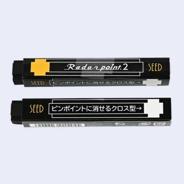 Two black and yellow erasers with 'Seed' branding on a light gray background