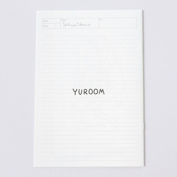 White sheet of paper with 'YUROOM' printed on a light gray background
