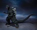 Godzilla action figure posed in a dynamic crouching stance against a dark, moody blue and gray backdrop with a dramatic shadow.