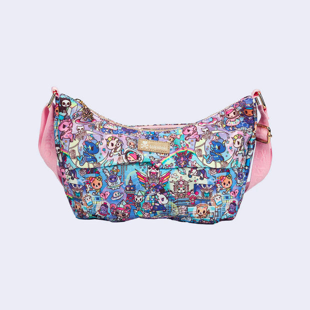 Shoulder purse with a long strap. Features pastel pink colored fabric detailing, around the zipper and as the handles/straps. Bag has a small "tokidoki" nameplate on the center and is covered completely in a busy colorful pattern featuring tokidoki characters with with galactic and sci fi imagery.