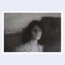 Black and white portrait of a woman with a blurred background