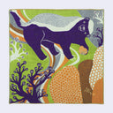 Colorful fabric square with a purple animal design on a white background