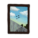 A semi-3D clay artwork, shaped like a card with a blue sky with white clouds, four black birds in flight, and a gray fence in the foreground, set against a plain white background. Scene is kept within a clay frame made to look like wood.