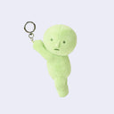 Plush keychain of a Smiski, dangling from a keyring.