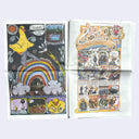 Open newspaper with colorful illustrations on a white background