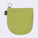 Green pouch with a key ring on a light gray background