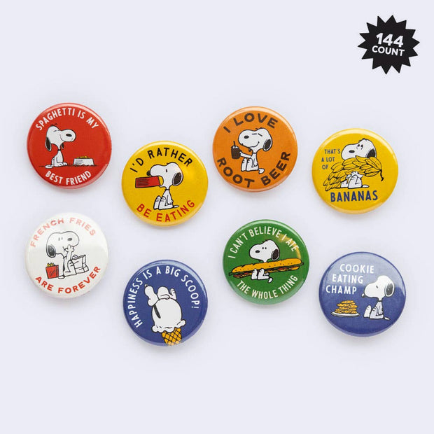 8 different food themed Snoopy tin button pins, all with a simplistic illustration of Snoopy with food and text around it.