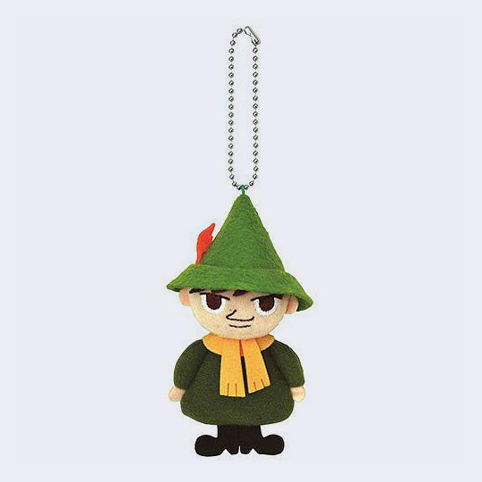 Plush keychain of Snufkin, from Moomin, wearing a pointy green hat with an orange feather and matching green outfit with a yellow scarf.