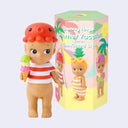 Vinyl figure of a Sonny Angel wearing a red and white striped shirt, no bottoms and an octopus atop its head. It holds a triple scoop ice cream cone in its hand.
