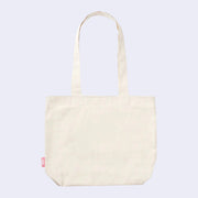 Back view of cream colored tote bag with a drop handle.