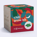 A cube-shaped product box for a 'chili grow kit' by Sprigbox, featuring a colorful graphic design with red, green, orange, and teal chili peppers, and a light wood-grain side panel.