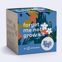 A square product box for 'forget me not grow kit' by Sprigbox, featuring a colorful floral illustration on a blue background with a light wood-grain side panel.