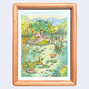 Ink and watercolor illustration of a pond, with lots of pond vegetation, rocks and greenery surrounding it. A mallard male duck stands on a rock and a female mallard duck swims in the pond. A turtle is positioned on a rock, looking in to the scene. Piece is framed.