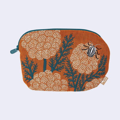 Pouch with nature-themed design featuring plants and a beetle on an orange background
