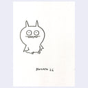 Black ink illustrawtion of a character with a rounded head, large eyes and fanged mouth with bat wings and ears. It sits and looks.